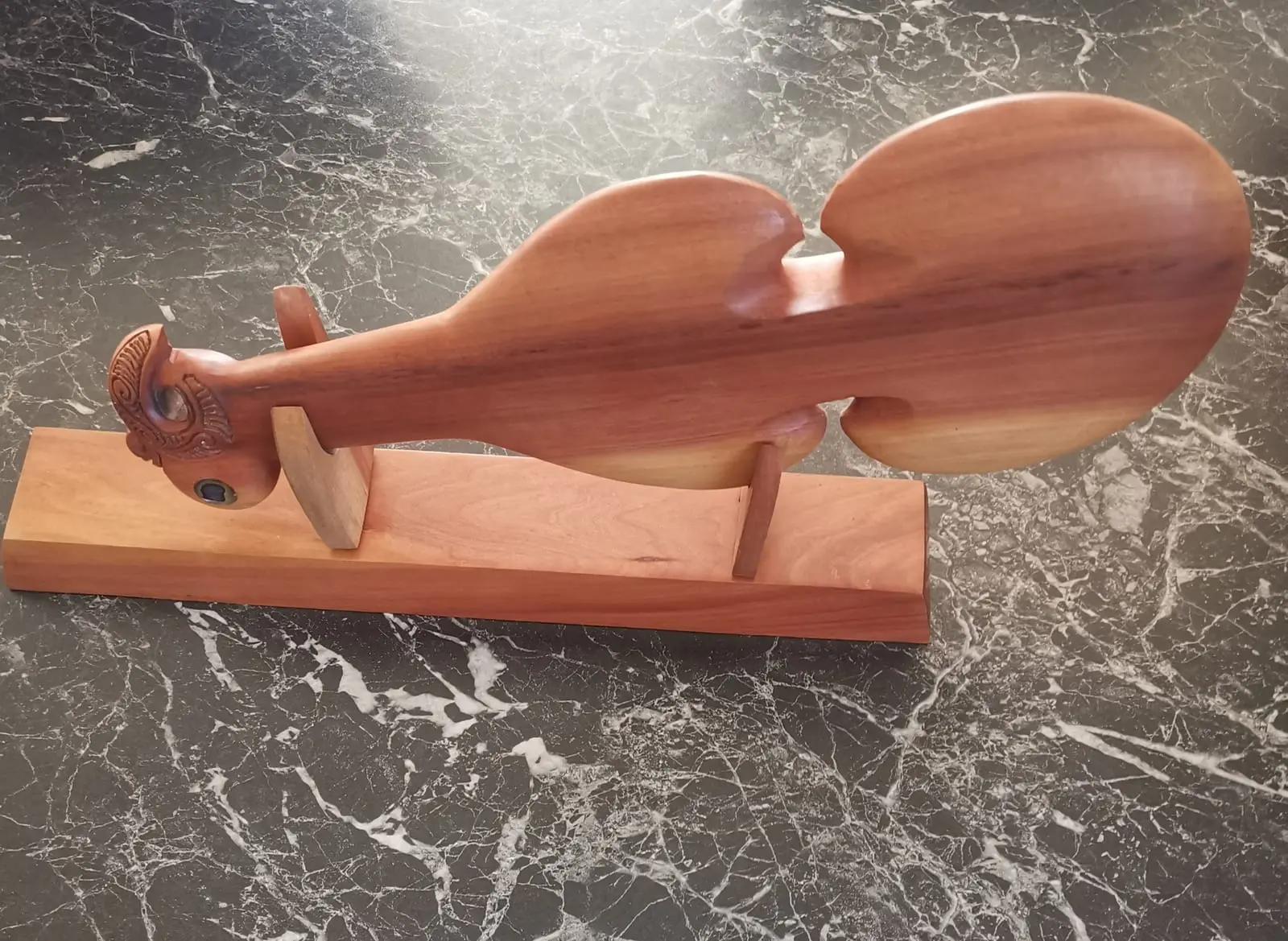 Wooden Kotiate on stand — view 1